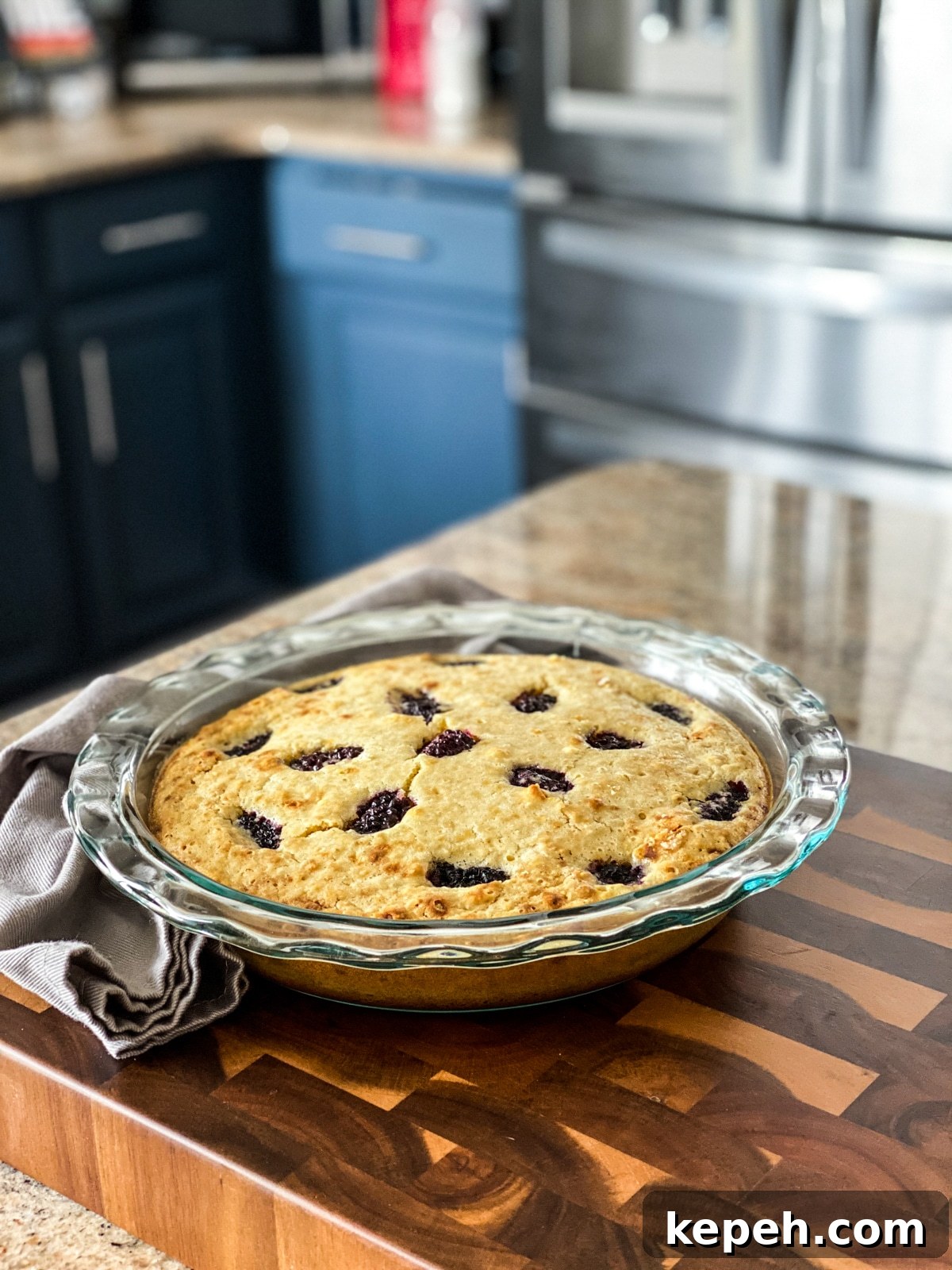 Italian Lemon Olive Oil Cake with Fresh Blackberries 16 Italian lemon olive oil cake on cutting board