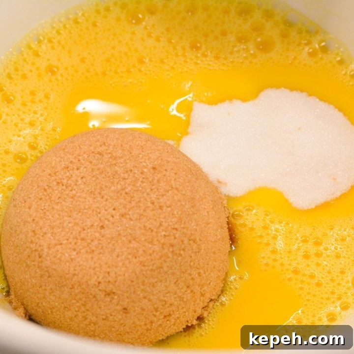 Strawberry Cheesecake Cookie Recipe: Soft Baked Strawberry Swirls 5 Combine the eggs and sugars in a large bowl and mix together using a hand mixer or stand mixer.