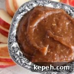 Creamy Vegan Fruit Dip Recipe for Parties and Snacks 11 Vegan fruit dip on a plate with apple slices.