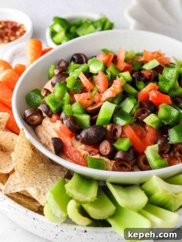 keto taco dip on a plate with celery