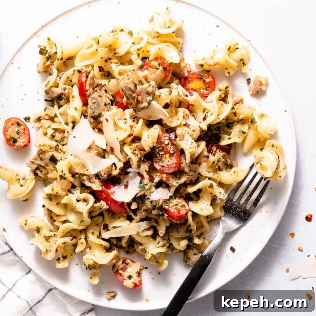 tuna pesto pasta on white plate