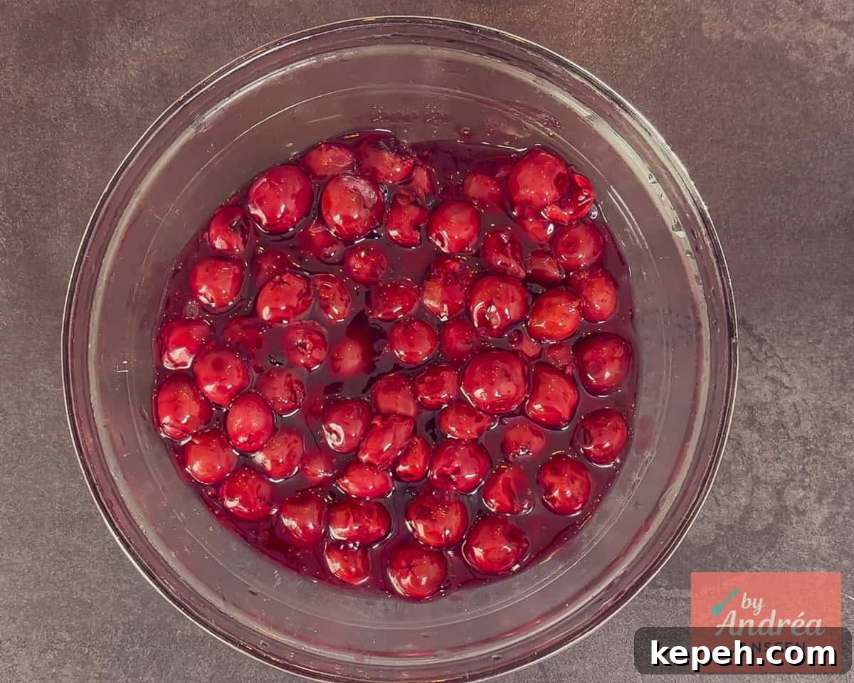 Cherry pie filling in a bowl to cool