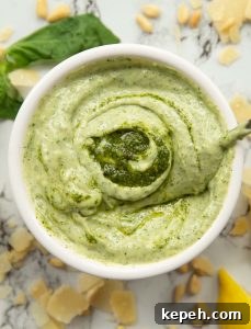 Pesto Mayonnaise overhead shot of pesto mayo in white pot surround by garnish