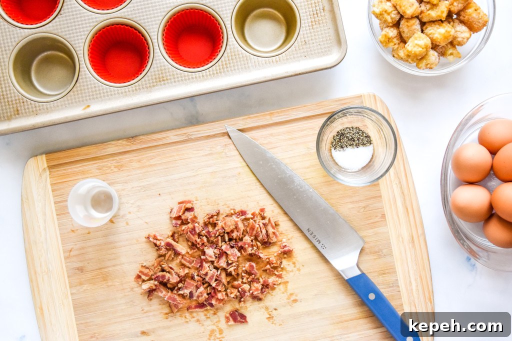 Tater Tot Crust Baked Egg Cups: Crispy Potato Breakfast Cups 4 chopping bacon for the tater tot crust baked egg cups.