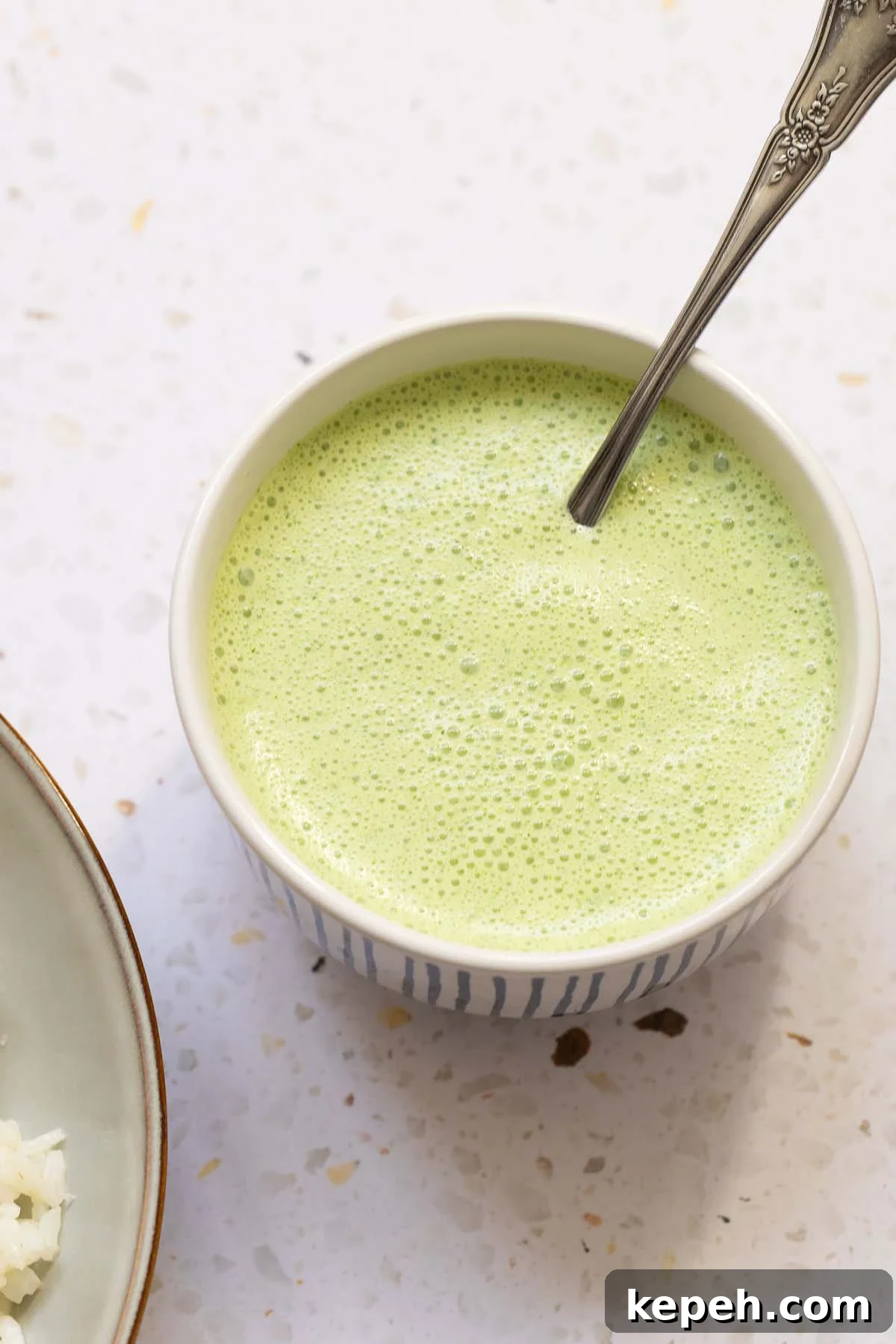 Creamy Mint Yogurt Sauce Recipe for Grilled Meats and Dips 6 Yogurt mint sauce in a bowl