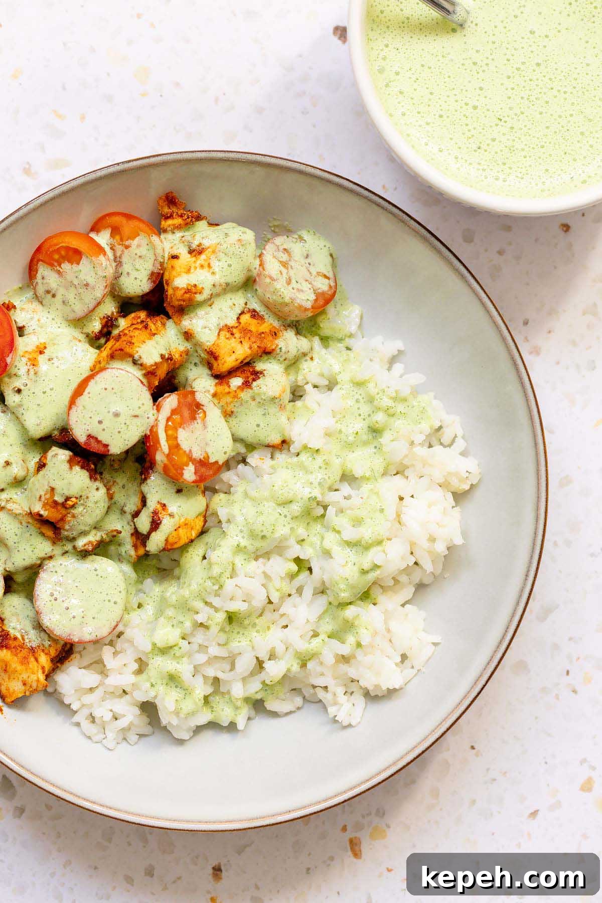 Creamy Mint Yogurt Sauce Recipe for Grilled Meats and Dips 7 Yogurt mint sauce topping chicken and rice