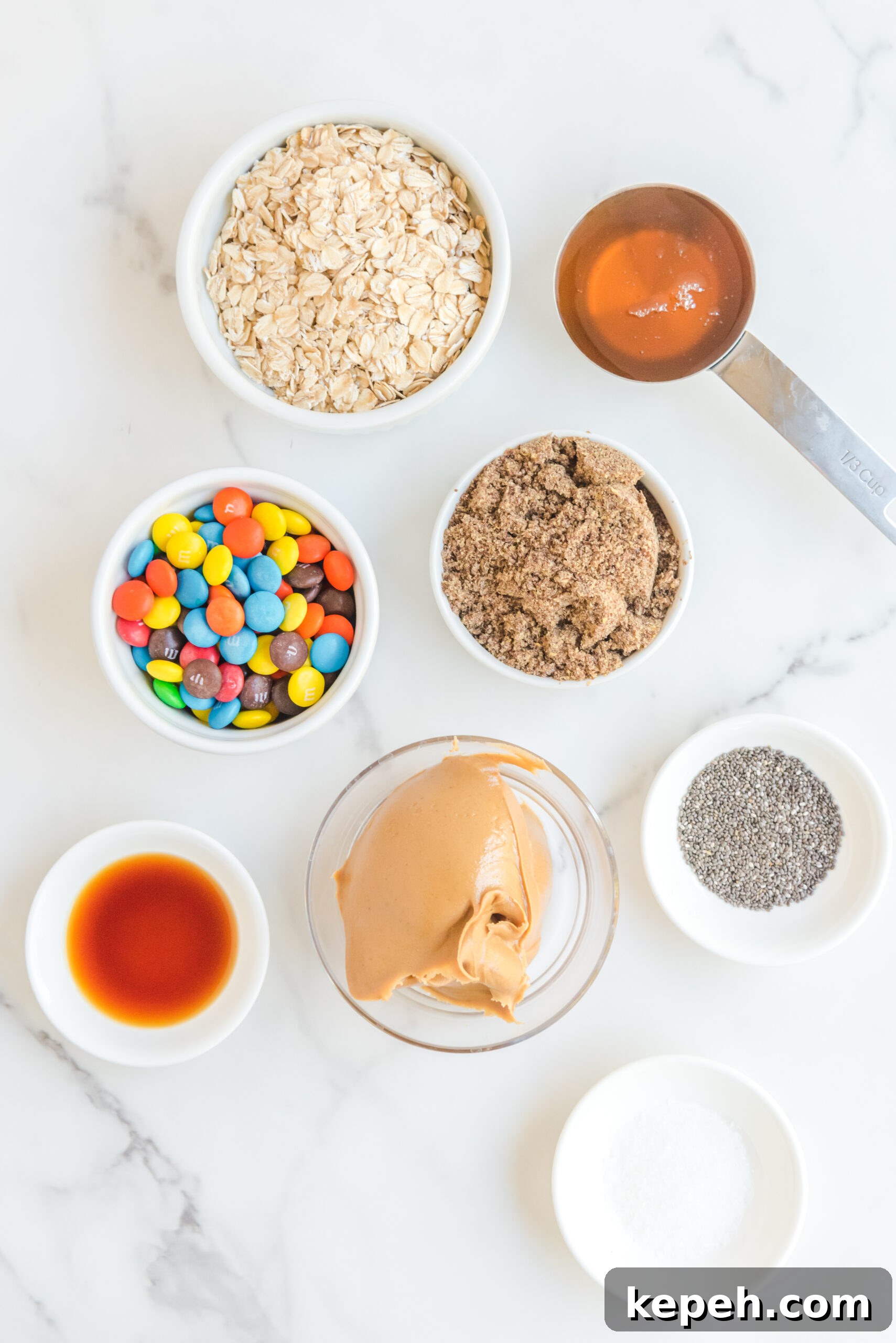 No-Bake M&M Energy Bites: Chocolate Peanut Butter Snack Balls 8 Overhead view of ingredients needed for this recipe.