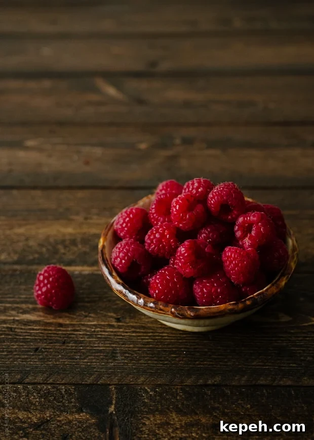 A bowl of fresh raspberries.