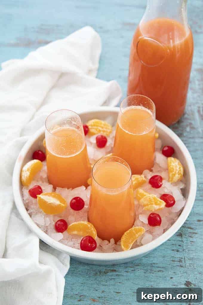 27 Refreshing Summer Punch Recipes to Keep Your Party Cool 12 mimosa punch
