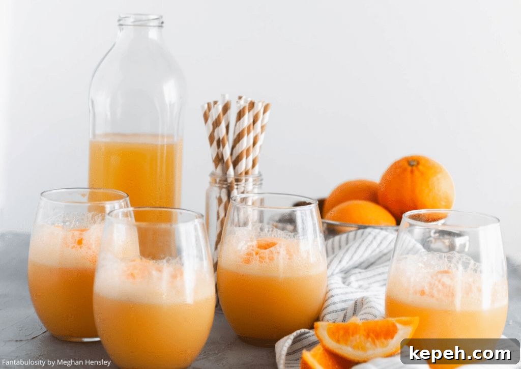27 Refreshing Summer Punch Recipes to Keep Your Party Cool 17 orange sherbert punch
