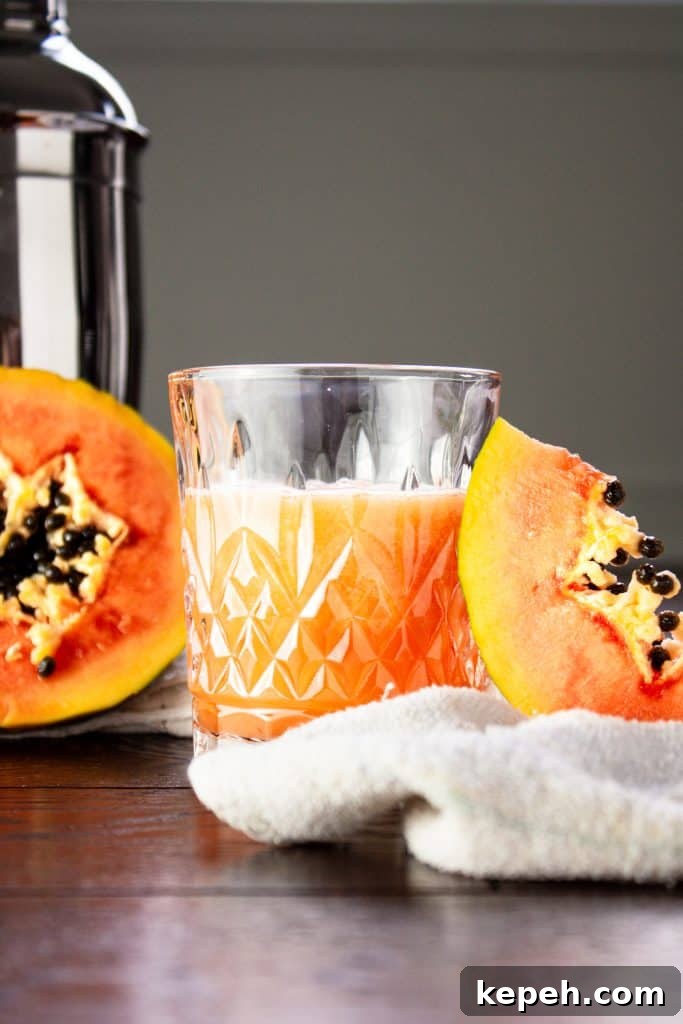 27 Refreshing Summer Punch Recipes to Keep Your Party Cool 9 papaya rum punch