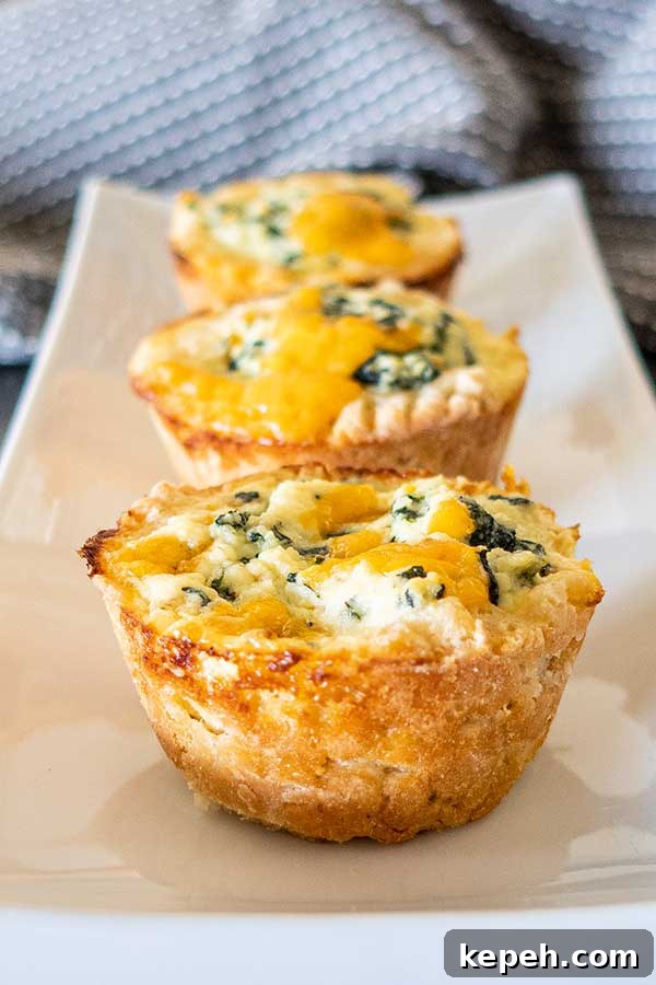 gluten free puff pastry spinach cheese cups on a platter