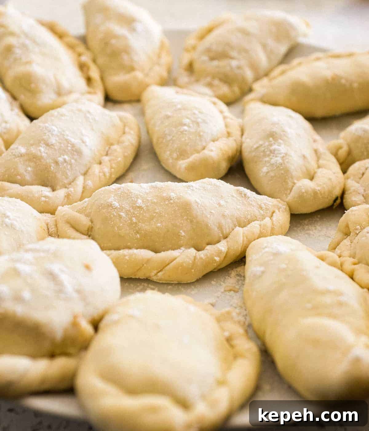 Panzerotti | www.cookeatworld.com Panzerotti folded and ready to cook on a plate