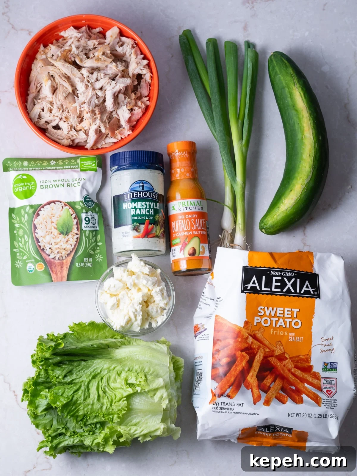 ingredient shot with everything needed to make buffalo chicken rice bowls