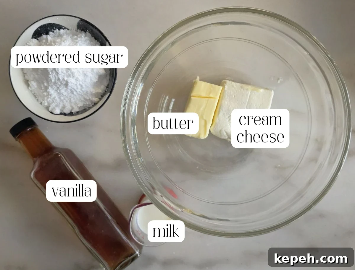 Gluten-Free Gingerbread Loaf Recipe That Delights 4 cream cheese frosting ingredients measured out and labeled.