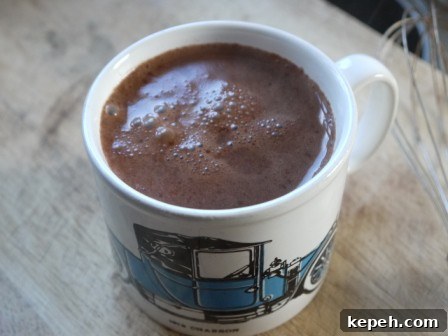 A white mug of Chilli Hot Chocolate
