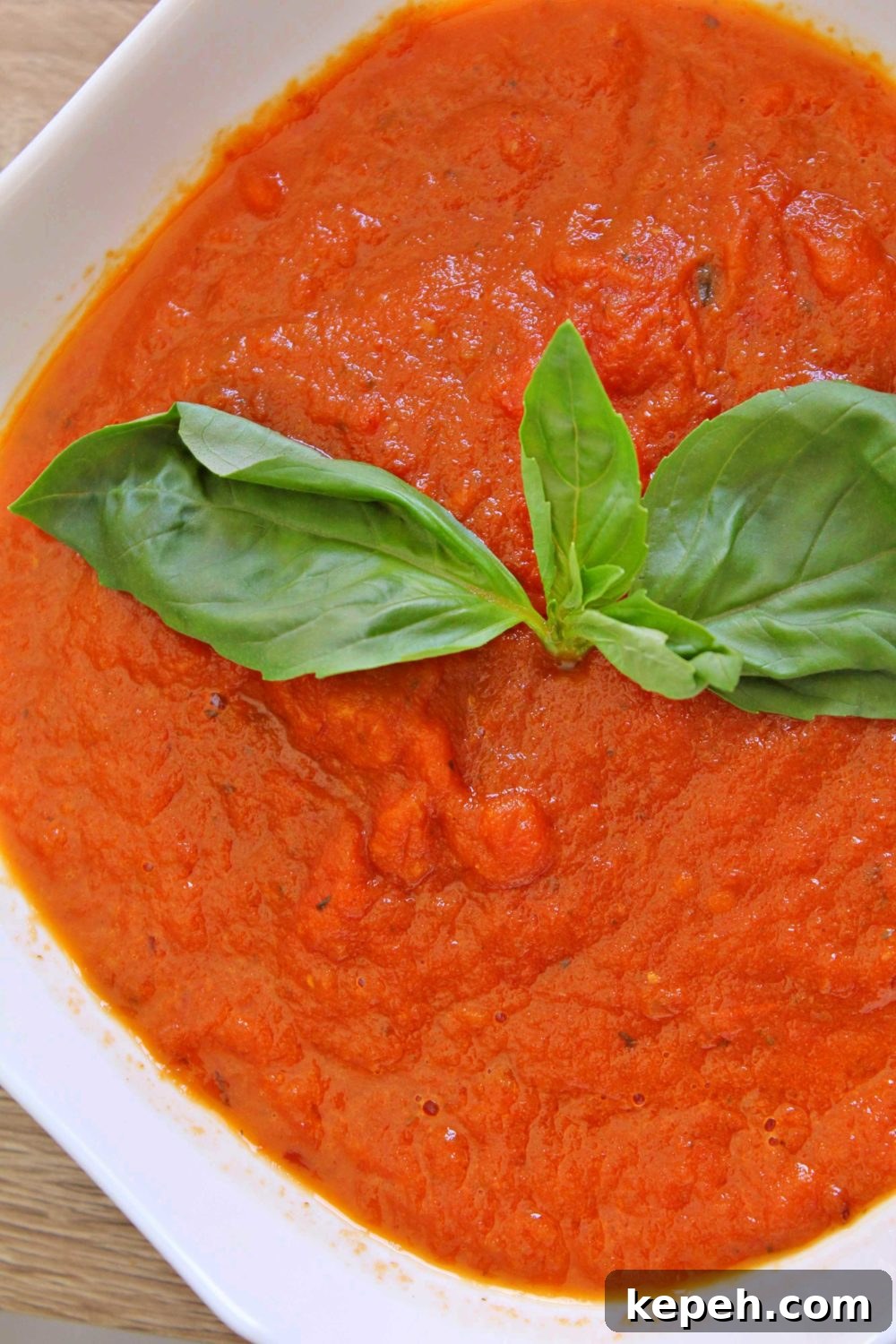 Creamy Tomato Basil Soup Recipe for Cozy Weeknight Meals 3 vegan tomato basil soup with fresh basil