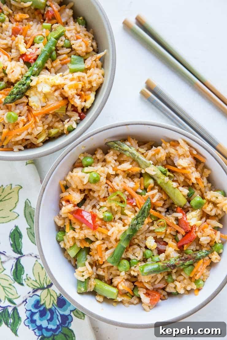 Red Curry Fried Rice - Thai style fried rice with red curry paste and plenty of vegetables