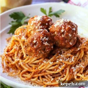 meatballs and sauce recipe served on top of spaghetti
