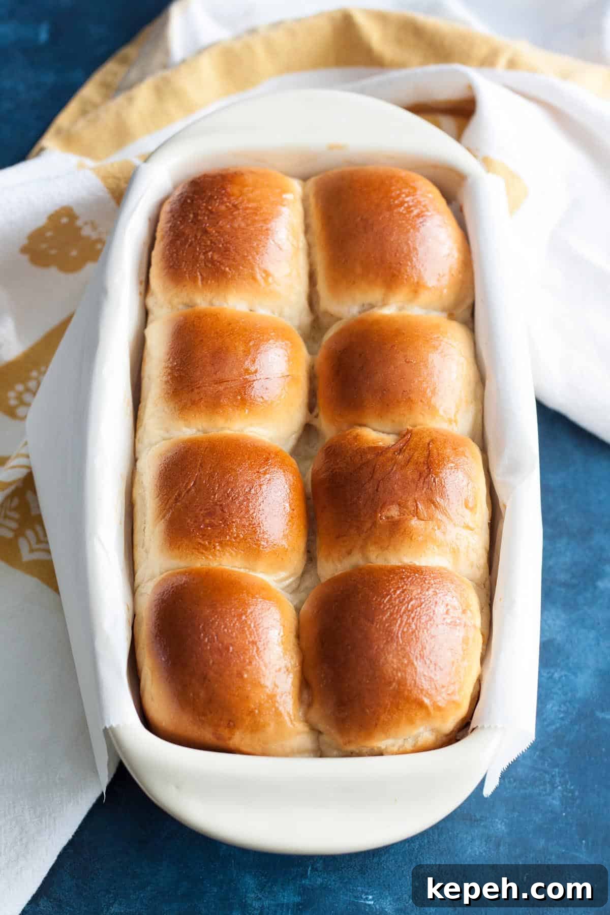 Freshly baked Hokkaido milk bread in a loaf pan. Freshly baked Hokkaido milk bread in a loaf pan.