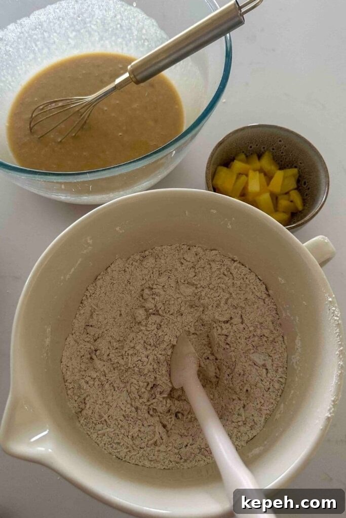 Sourdough Banana Bread with Hawaiian-Style Sweetness 7 Sourdough Hawaiian banana bread dry ingredients mixed together in large white bowl.