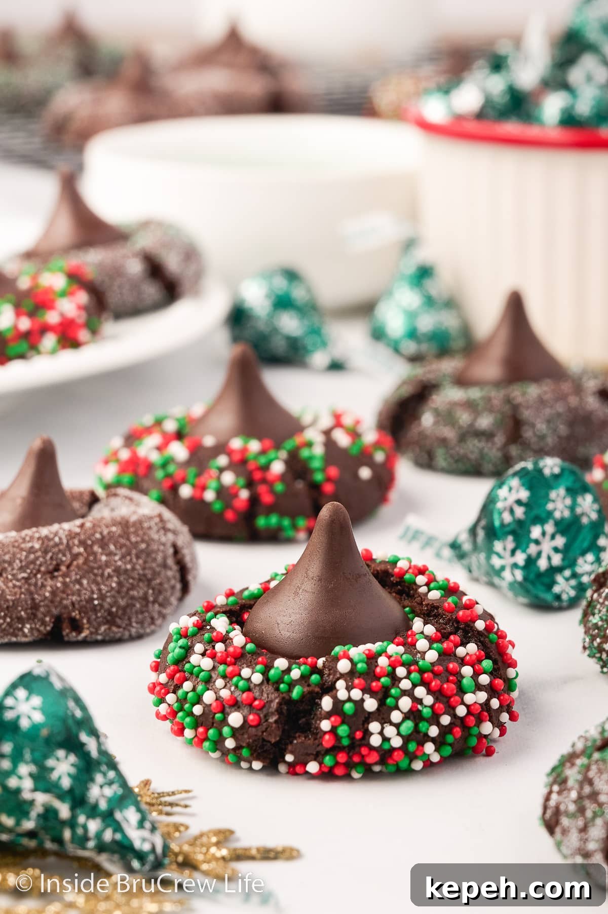 Chocolate sprinkle cookies topped with chocolate kisses.