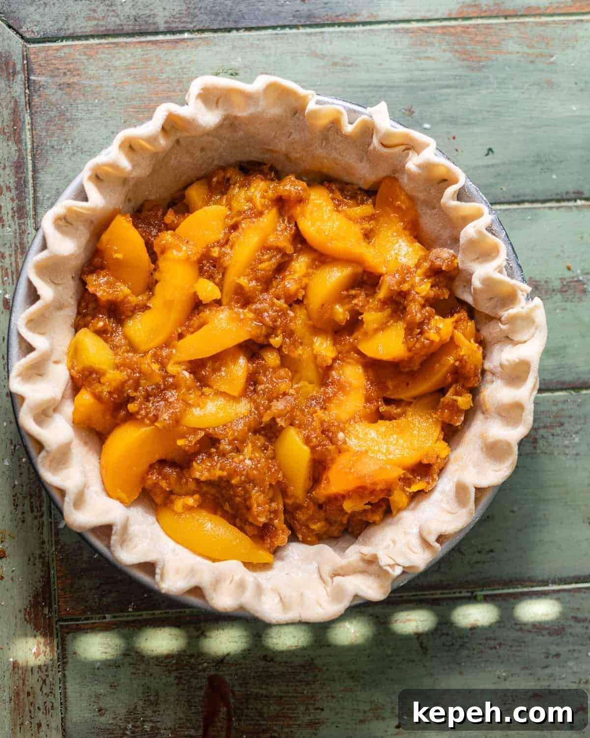 Perfect Peach Pie Recipe Using Canned Peaches 6 peach filling inside of the pie crust.