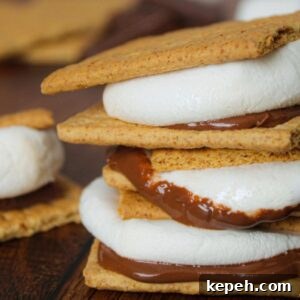 Three air fryer s'mores stacked on top of one another.