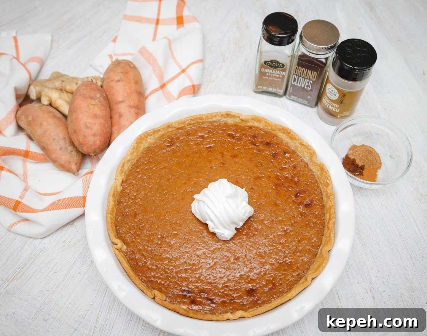 Black folks’ sweet potato pie with fresh sweet potatoes and cinnamon, nutmeg, and clove — showing the proper spice balance and ingredient choices to avoid grainy or bland sweet potato pie filling.
