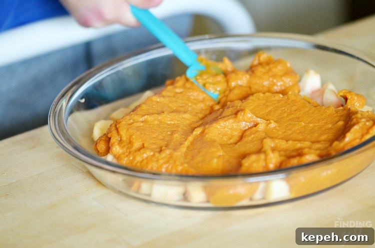 Adding Pumpkin Filling to Apple Pumpkin Pie