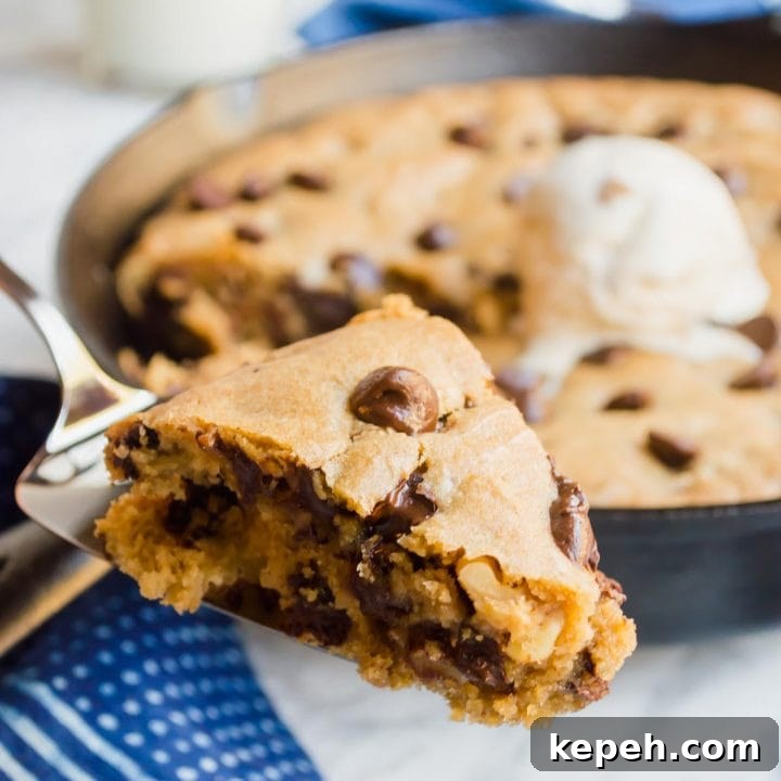 Slice of Chocolate Chip Skillet Cookie.