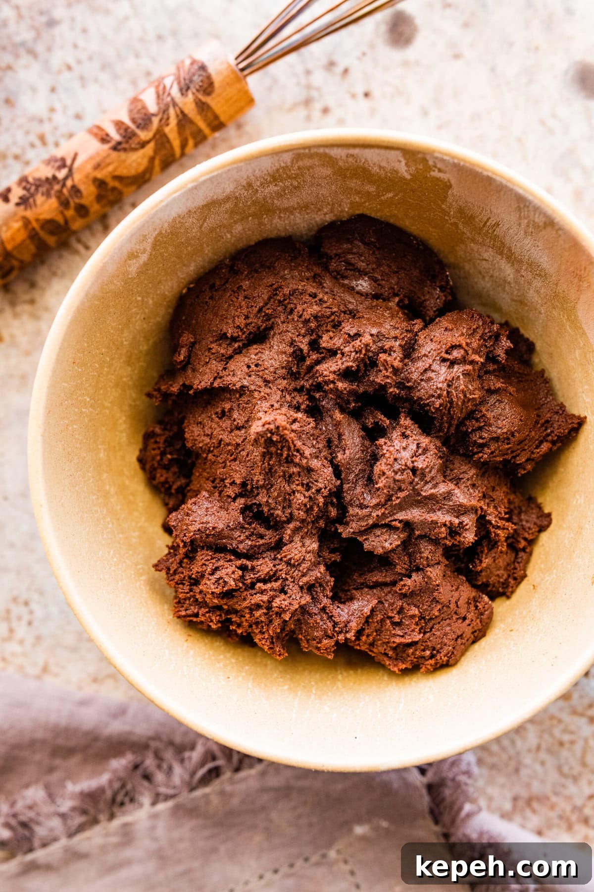 How to make chocolate crinkle cookies step-by-step: the batter will be thick. Must rest the batter 3 hours to overnight.