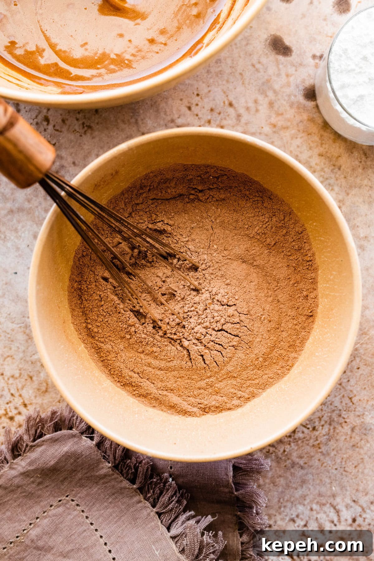 How to make chocolate crinkle cookies step-by-step: Mix all the dry ingredients to combine.