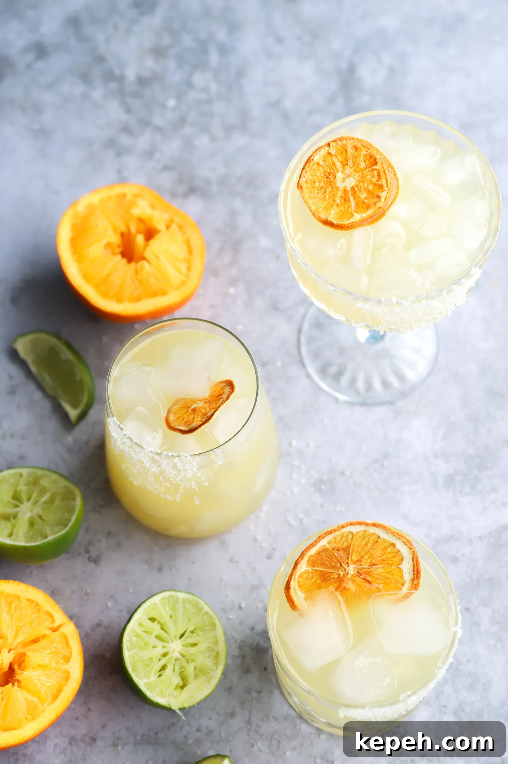 Texas Margarita Recipe: Classic Tex-Mex Cocktail Guide 2 Image of texas margaritas in glasses with orange slices