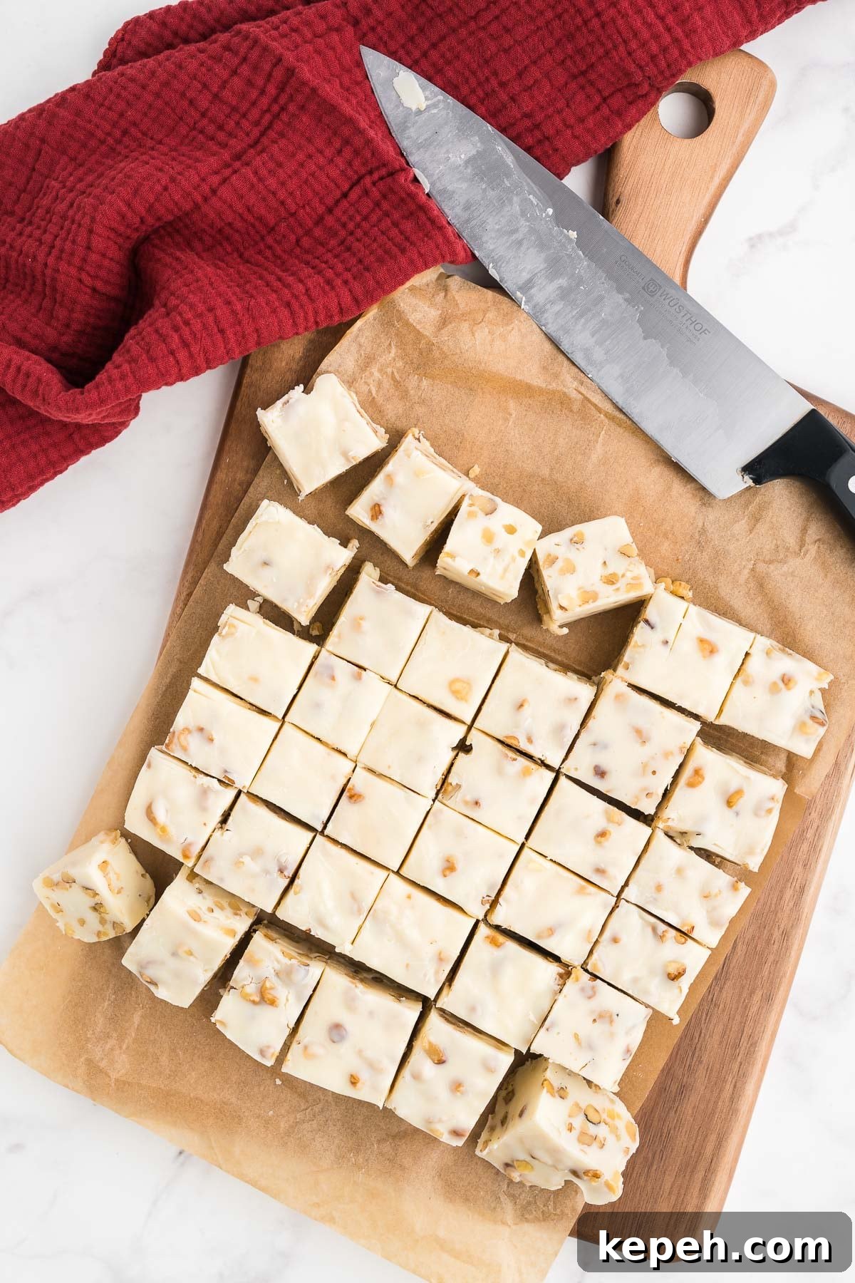 Maple Walnut Fudge Recipe: Rich Homemade Fudge with Pecans 6 cutting fudge