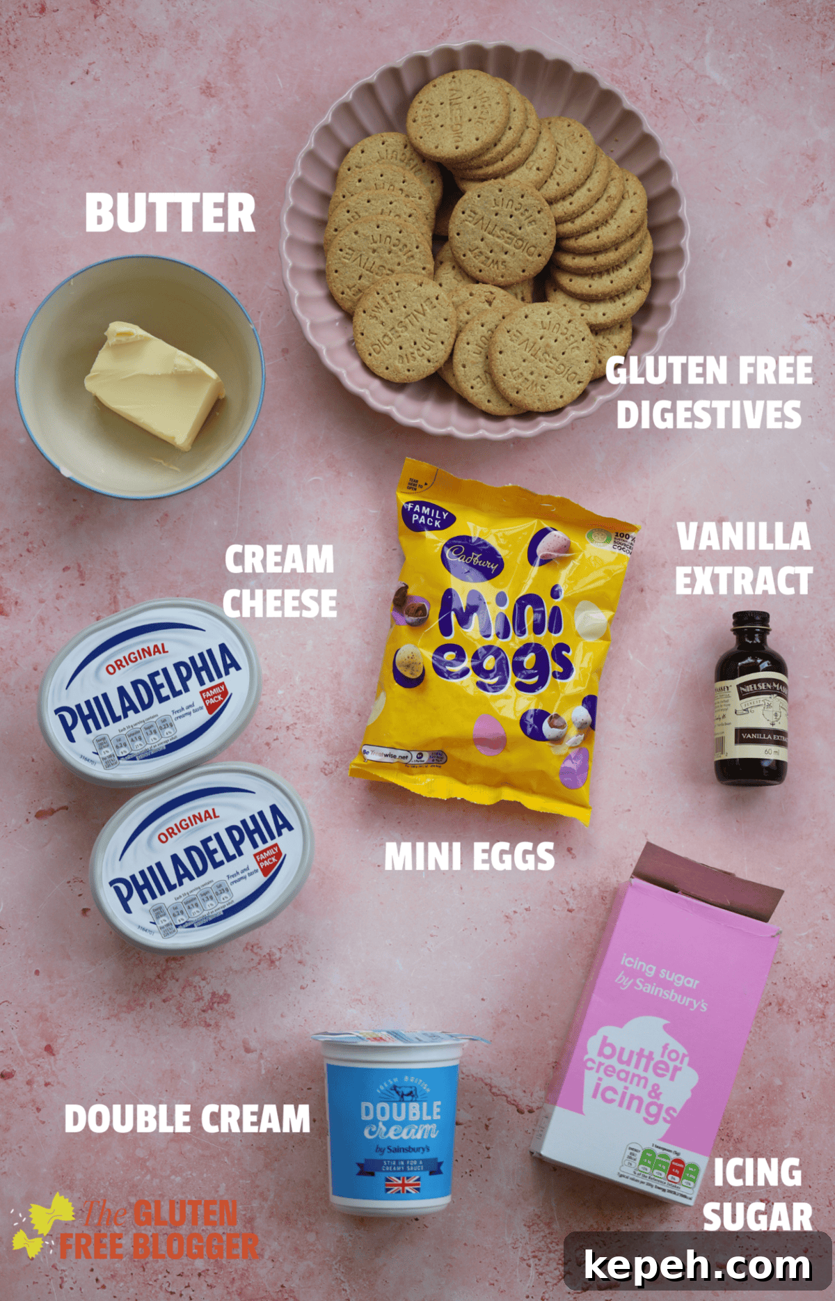 Mini Egg Cheesecake Recipe: Creamy No-Bake Easter Dessert 4 Ingredients for my no bake mini egg cheesecake on a pink backdrop.