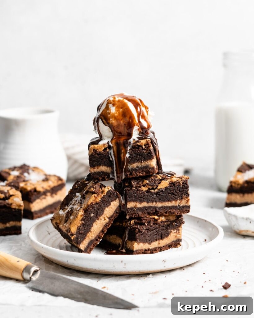 fudgy Peanut Butter stuffed brownies with peanut butter swirl on top 