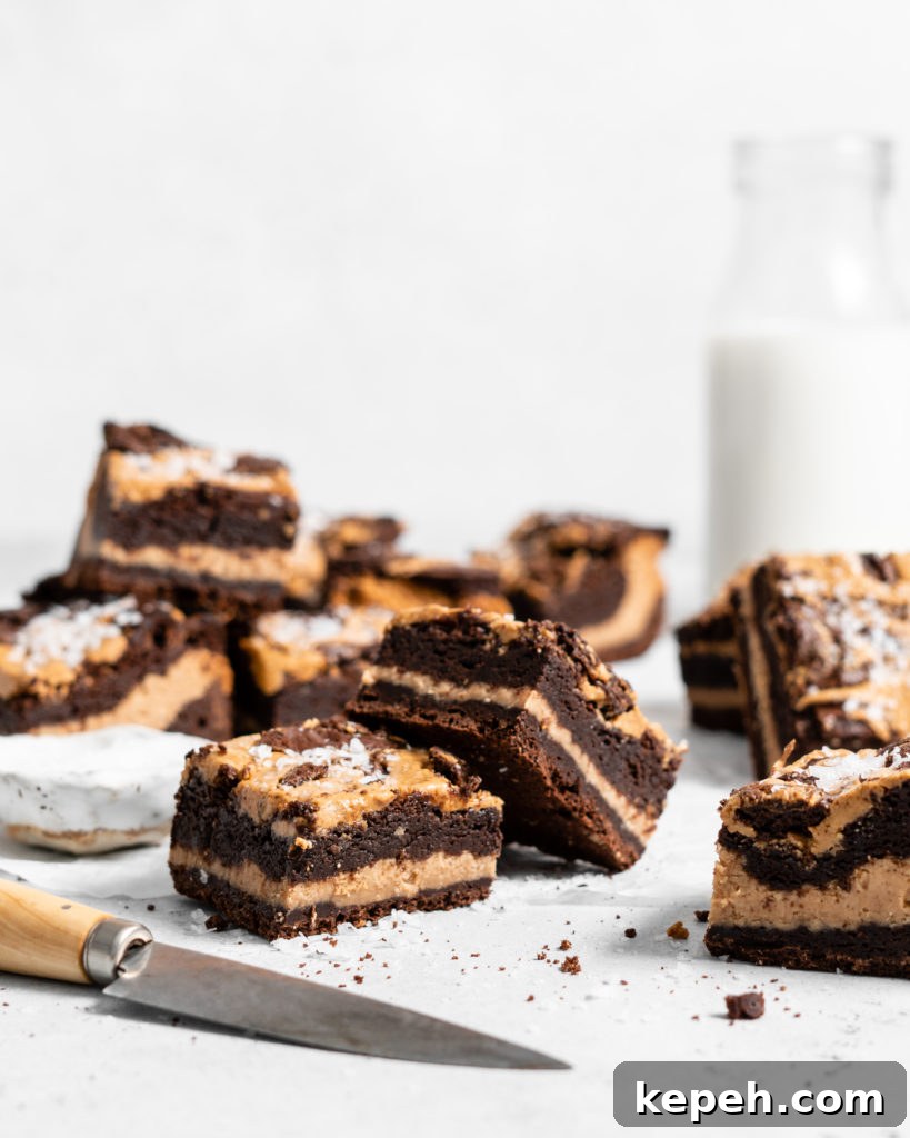 fudgy Peanut Butter stuffed brownies with peanut butter swirl on top