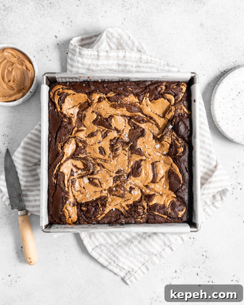 fudgy Peanut Butter stuffed brownies with peanut butter swirl on top