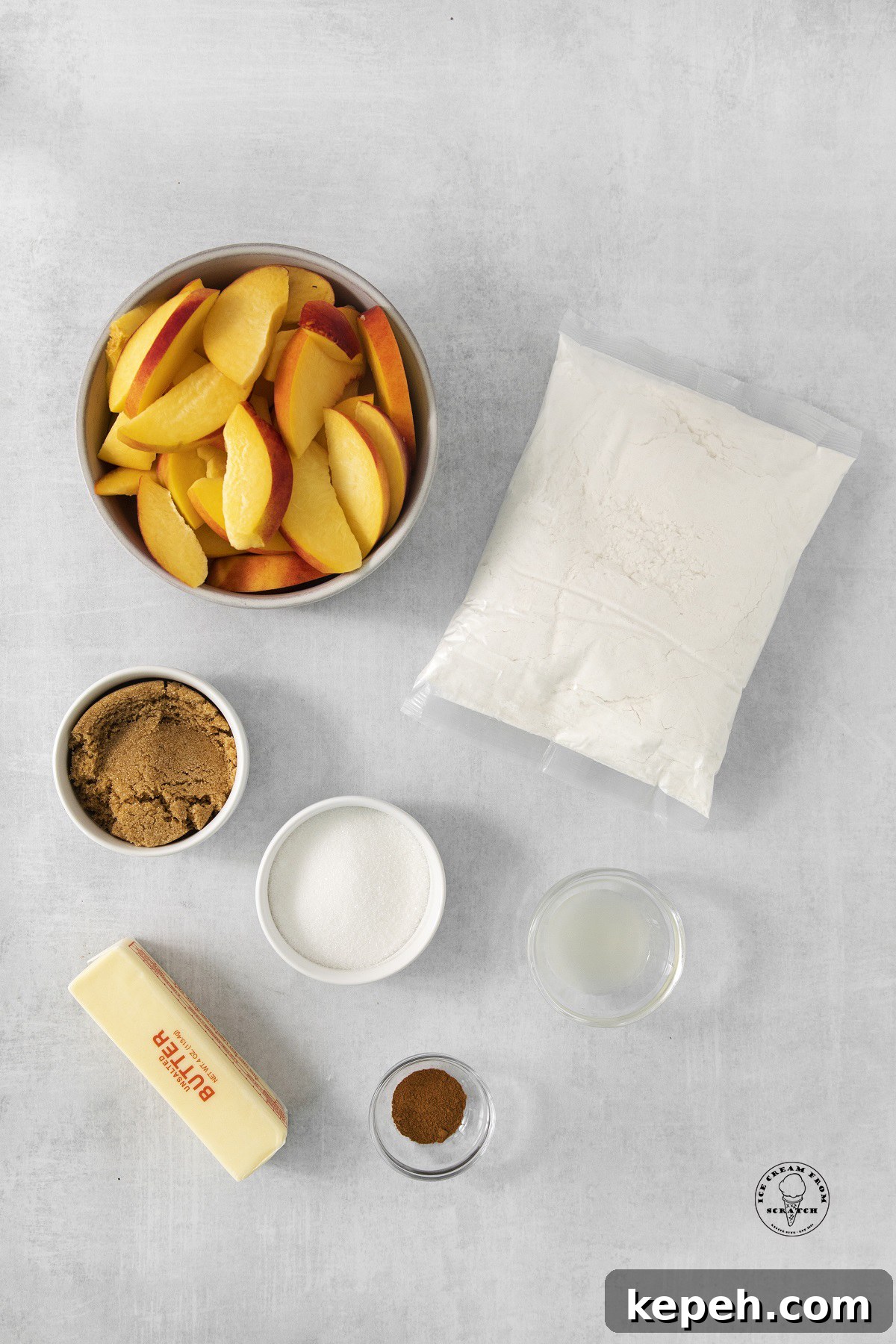 The ingredients needed to make crockpot peach cobbler with fresh peaches, cake mix, butter, and sugar.