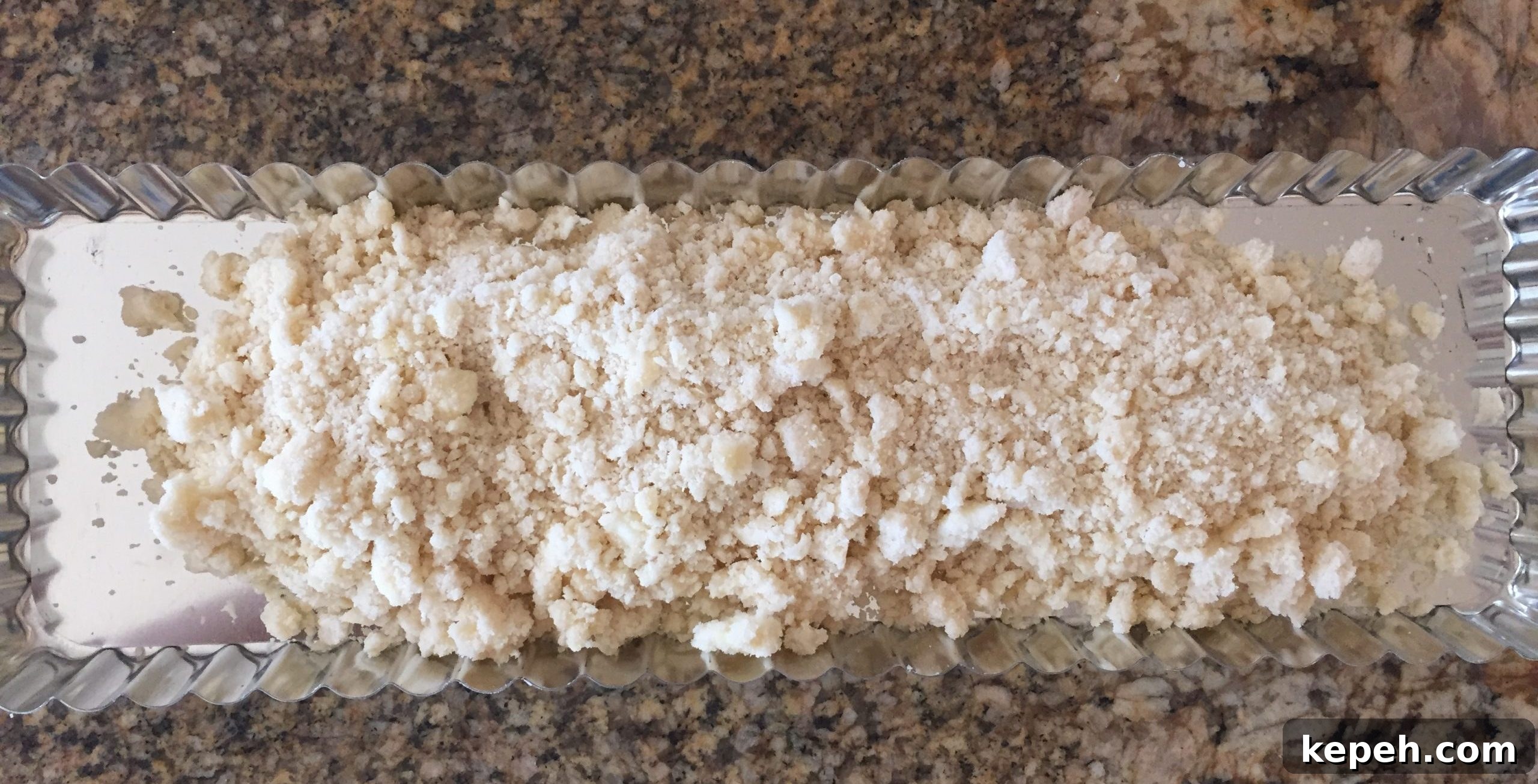 Sweet pastry crumbles in tart pan