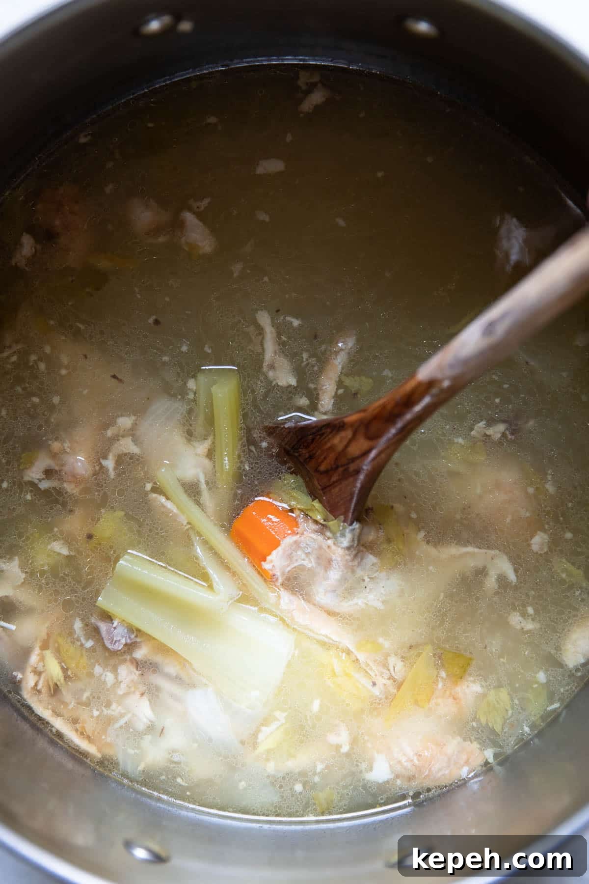 ingredients in a pot with broth