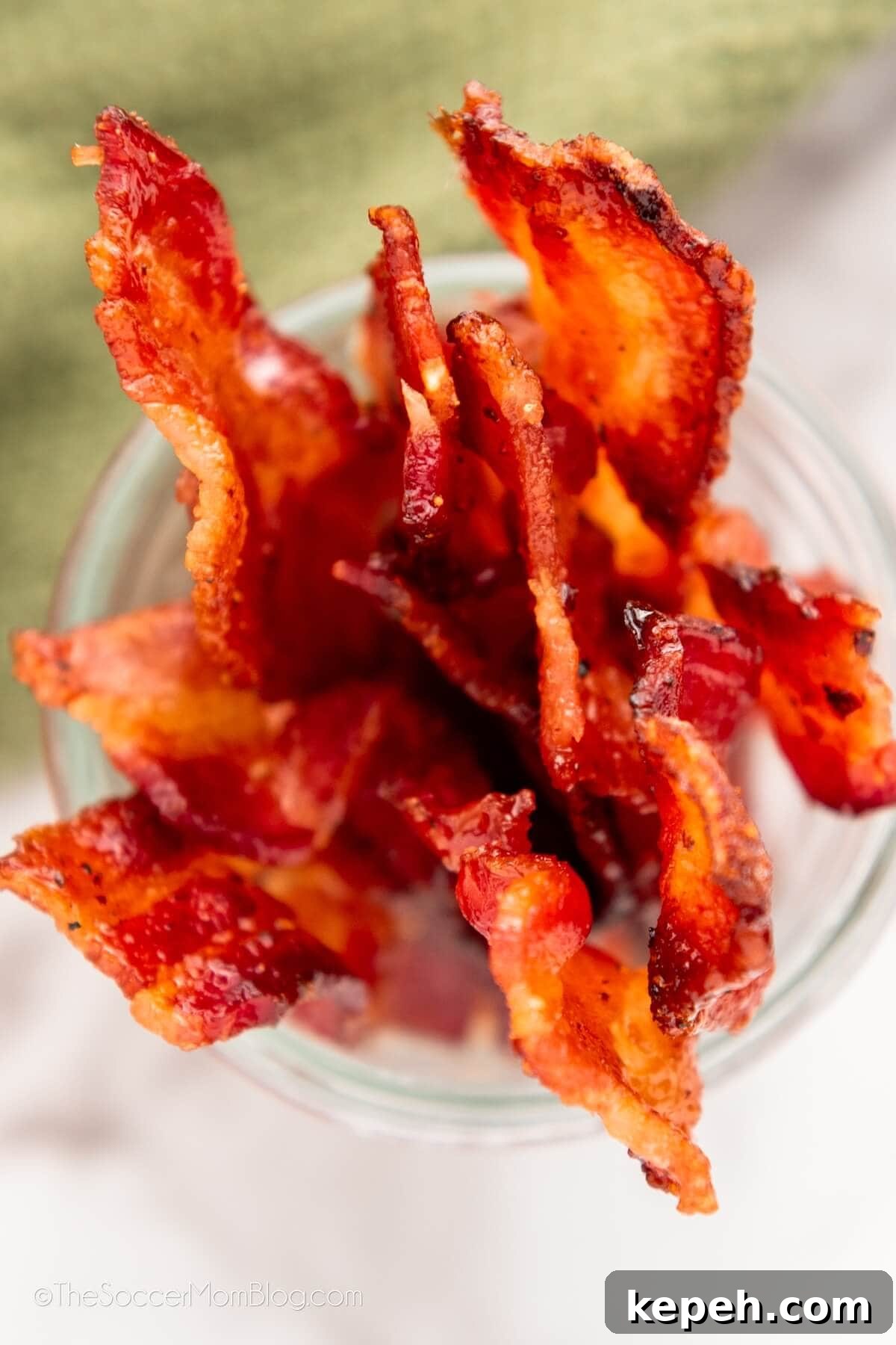 How to Make Crispy Sweet Candied Bacon at Home 5 top-down view of crispy candied bacon stored in a mason jar
