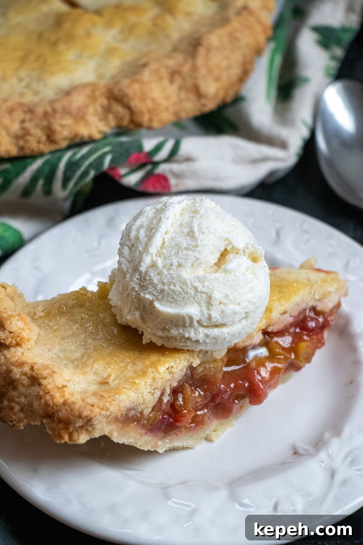 Strawberry Rhubarb Pie Recipe: Sweet-Tart Summer Dessert 2 Strawberry Rhubarb Pie slice with ice cream