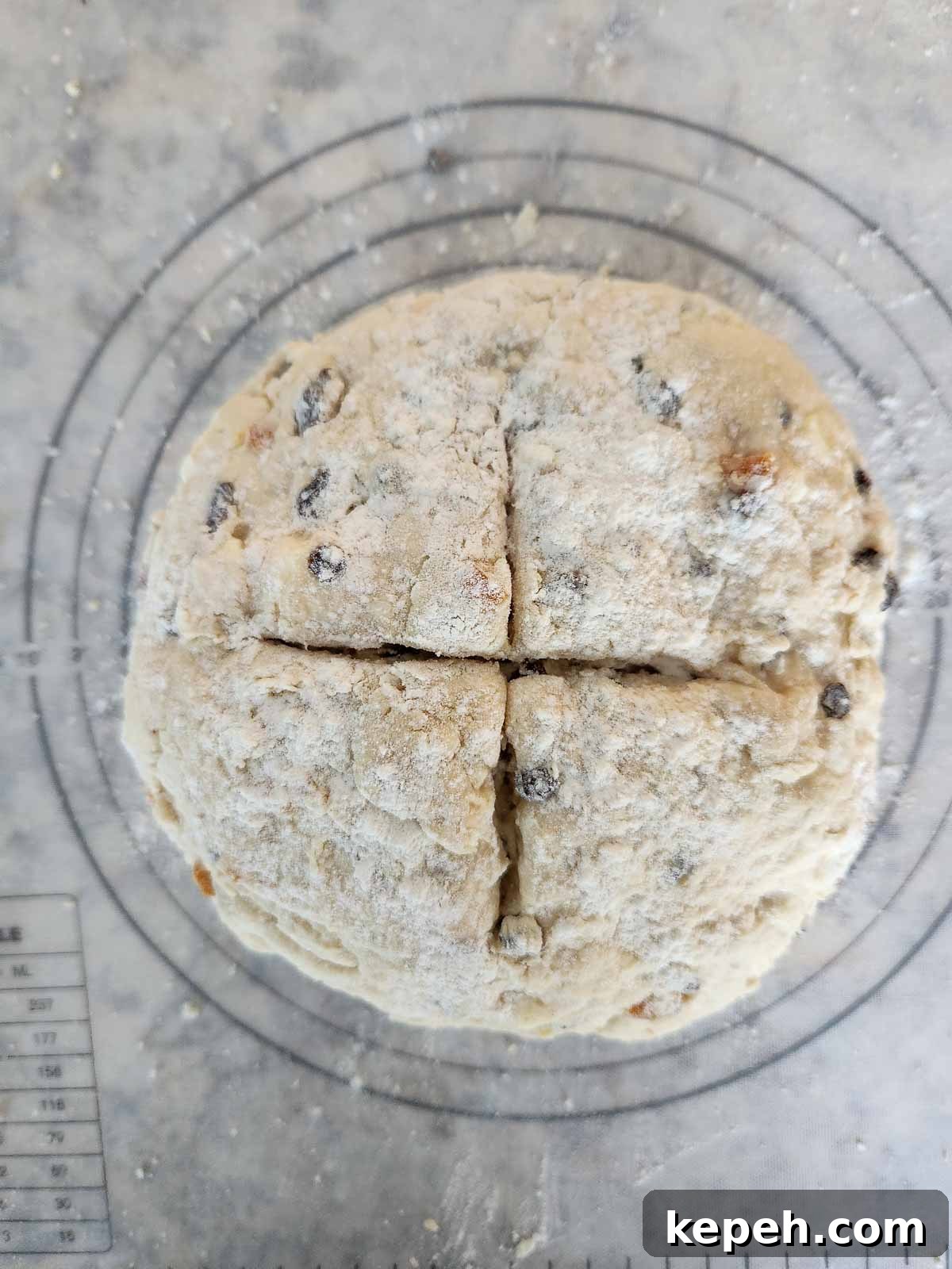 Irish soda bread dough on a baking mat.