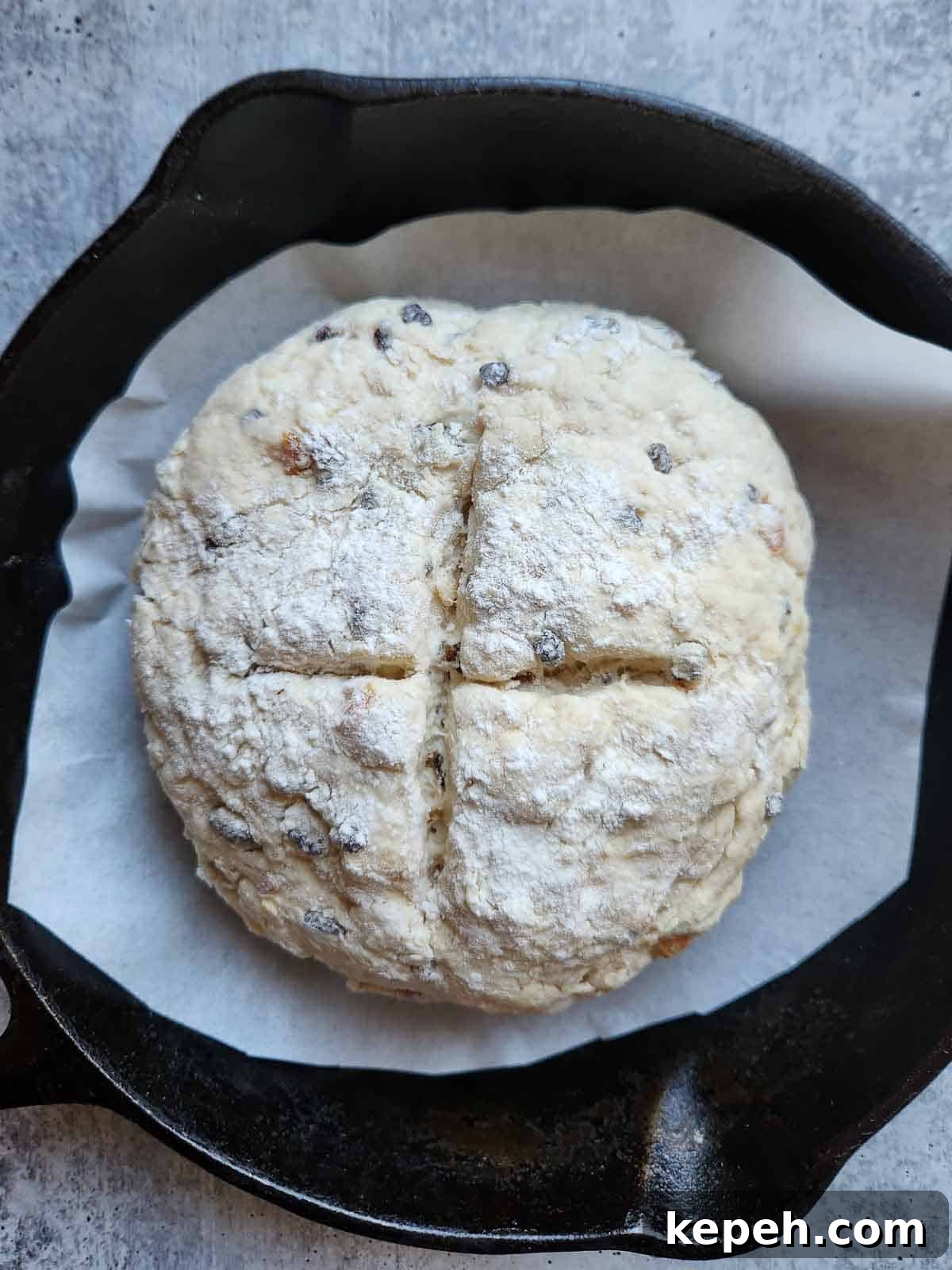 Irish soda bread dough in a cast iron skillet.