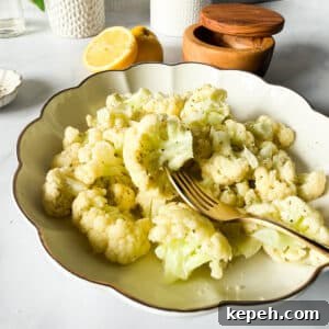 Garlic Butter Microwave Cauliflower Recipe for Quick Sides 14 a bowl of steamed garlic butter cauliflower