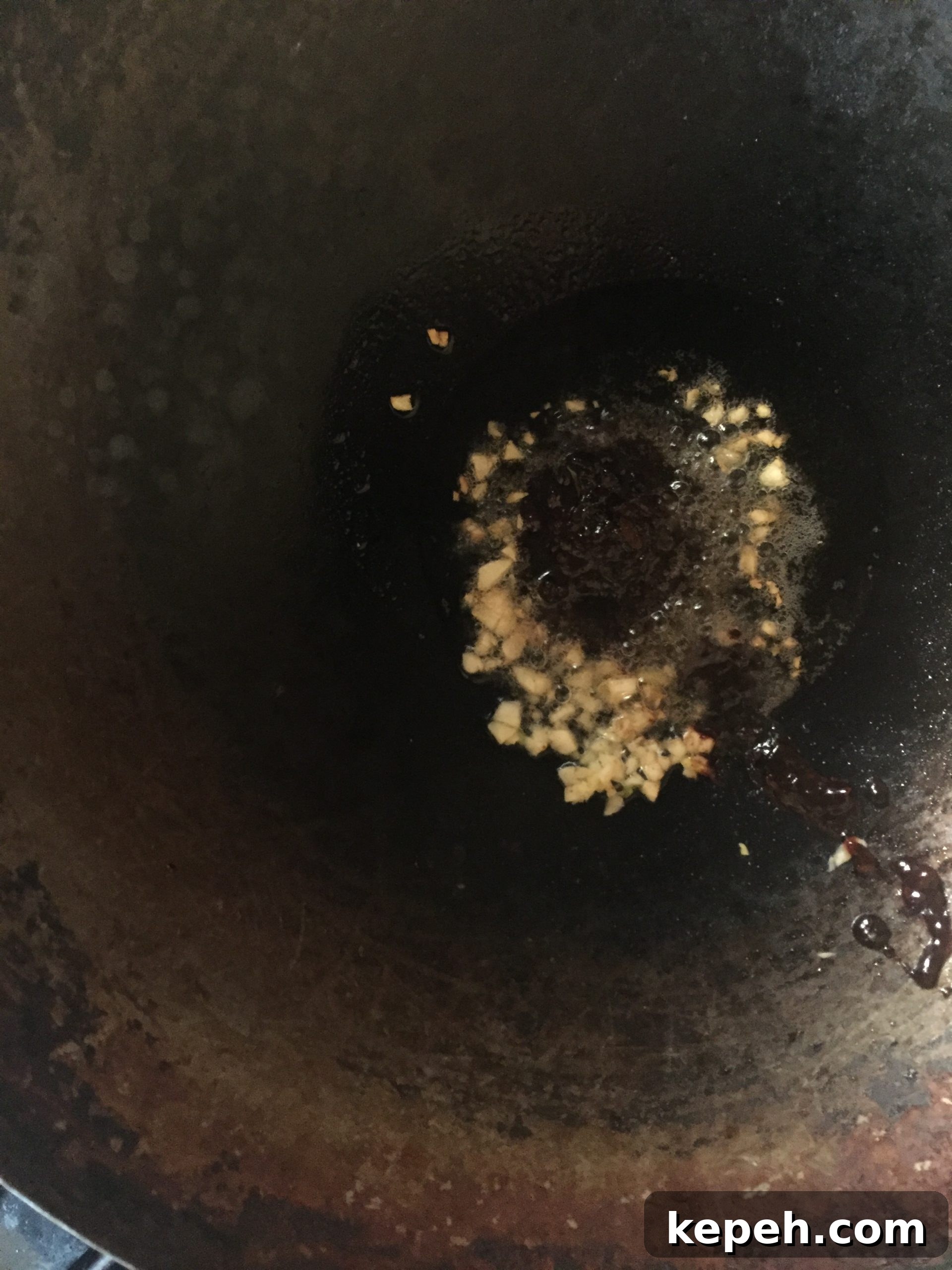 Always fry chopped garlic first.
