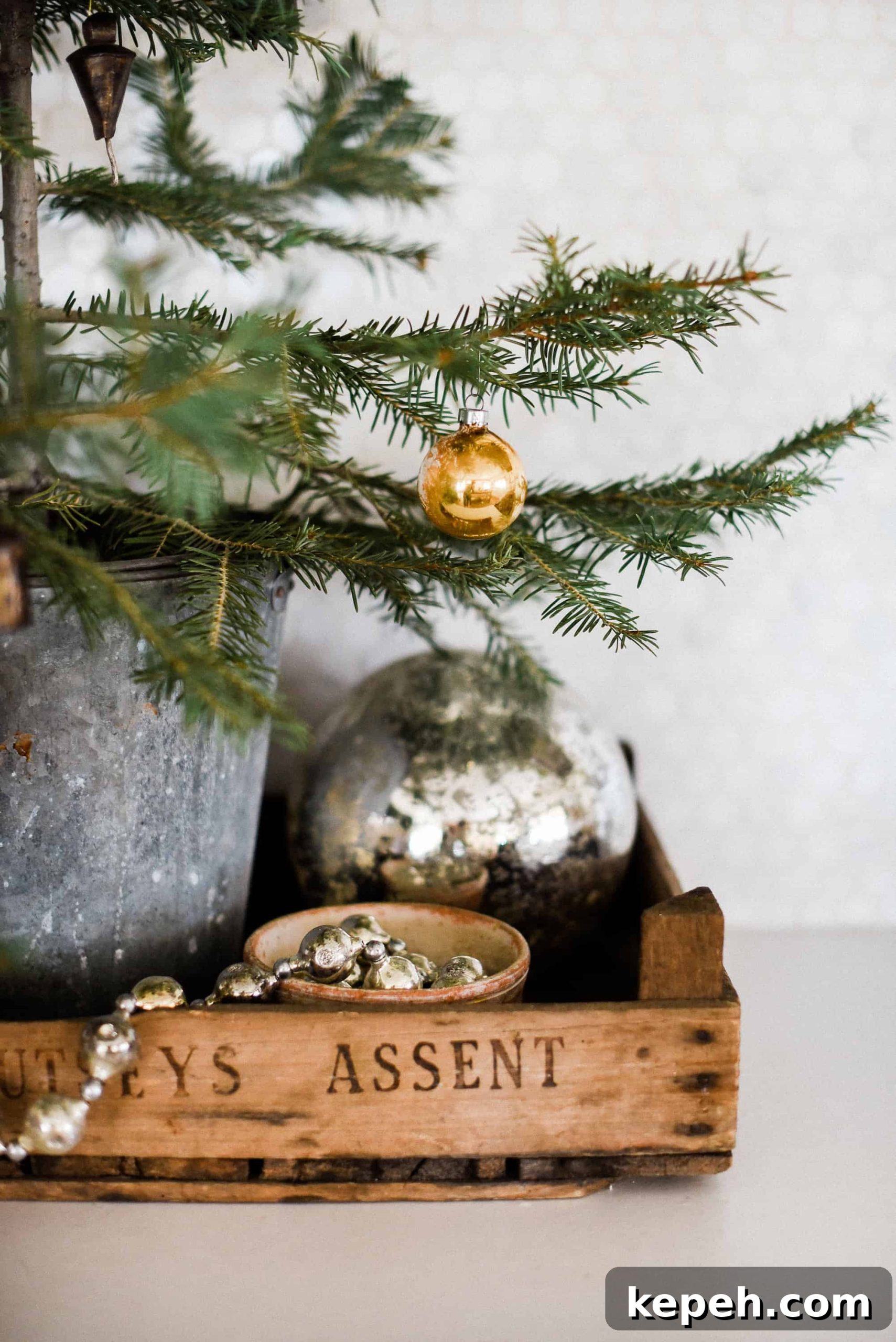 Farmhouse Christmas Kitchen Decorating Ideas for Cozy Holiday Charm 3 Tour our Christmas kitchen to gather ideas for decorating for the holidays this year! Use greenery and vintage touches to keep things simple and cohesive!