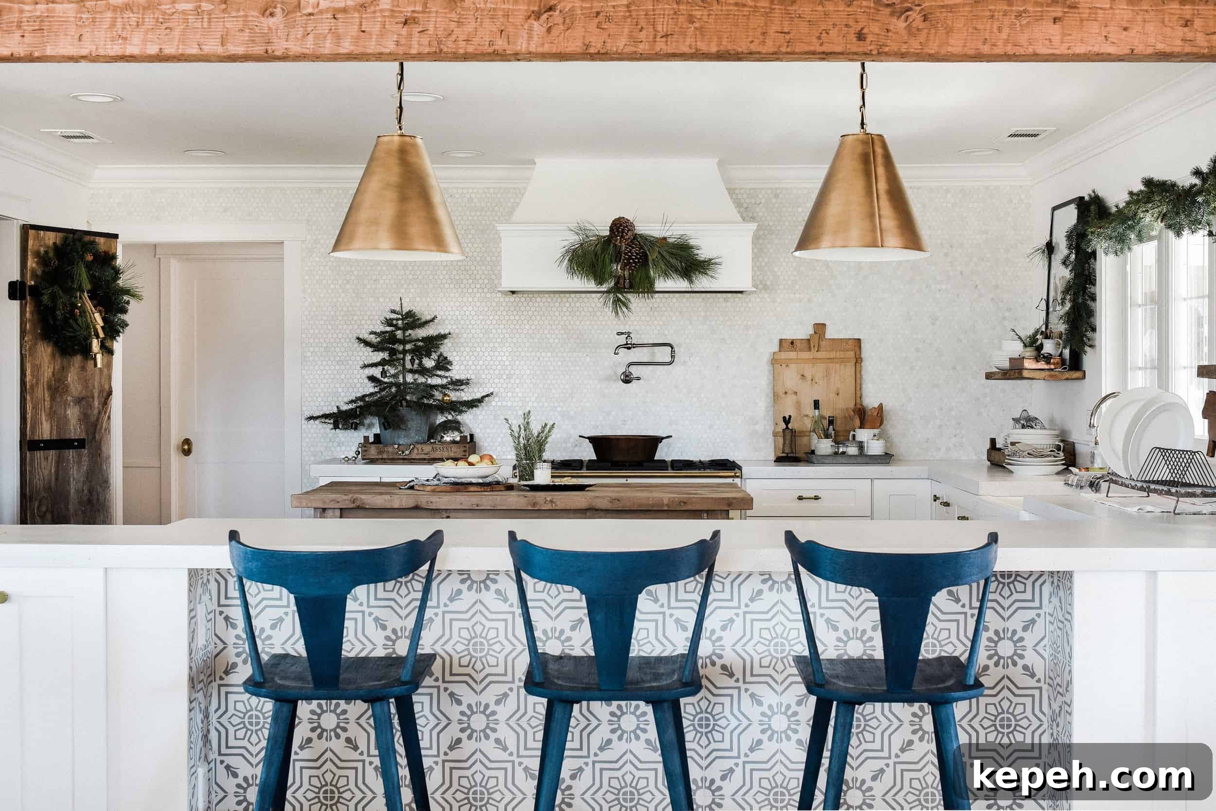 Farmhouse Christmas Kitchen Decorating Ideas for Cozy Holiday Charm 5 Tour our Christmas kitchen to gather ideas for decorating for the holidays this year! Use greenery and vintage touches to keep things simple and cohesive!